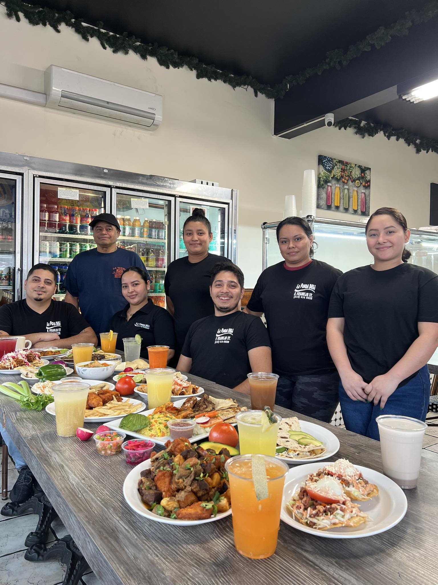 Friendly team at La Fonda Deli